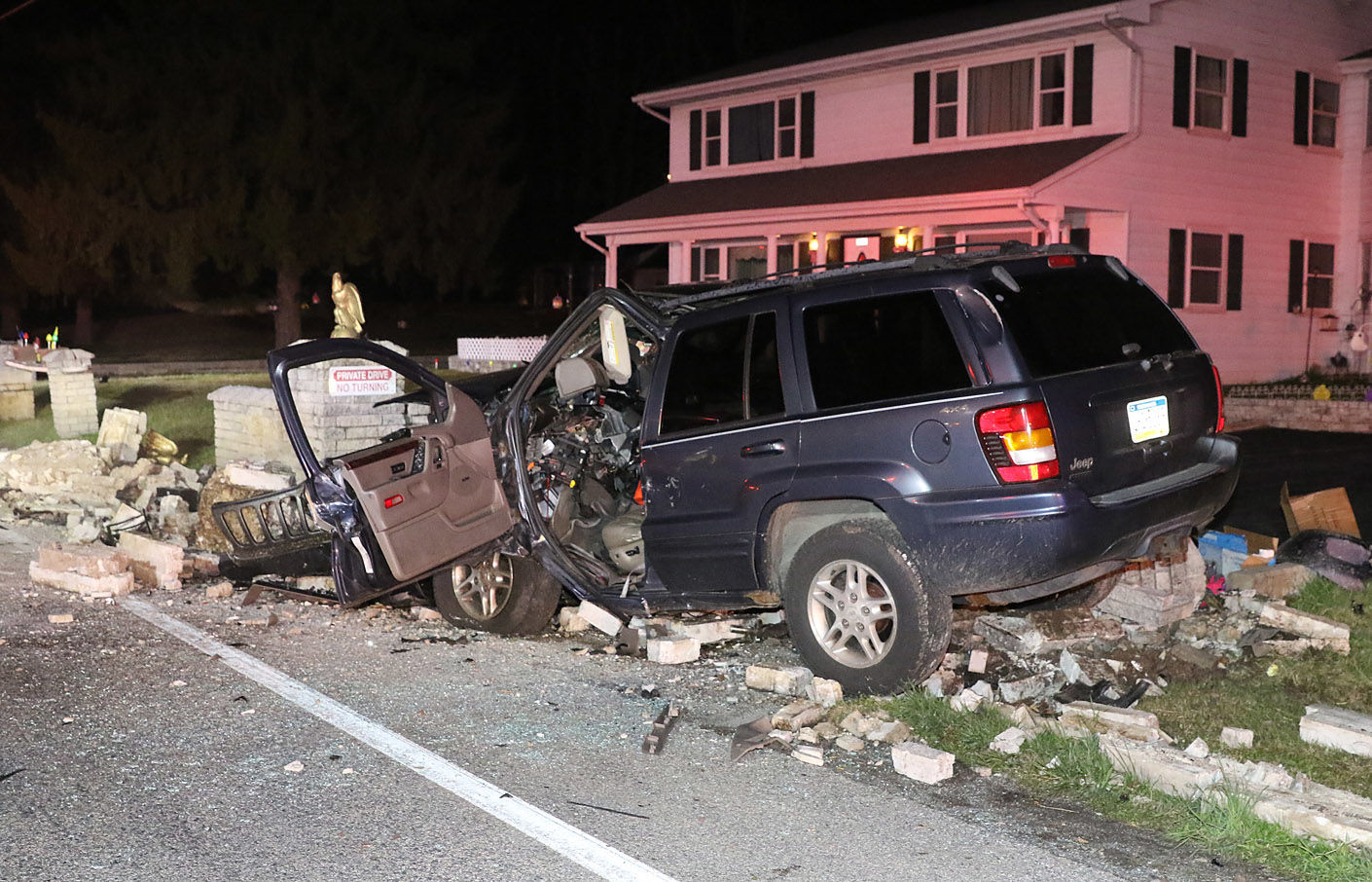 SUV hits wall, driver transported